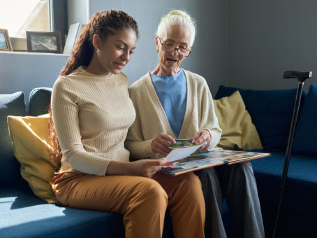 senior woman talking to her caregiver